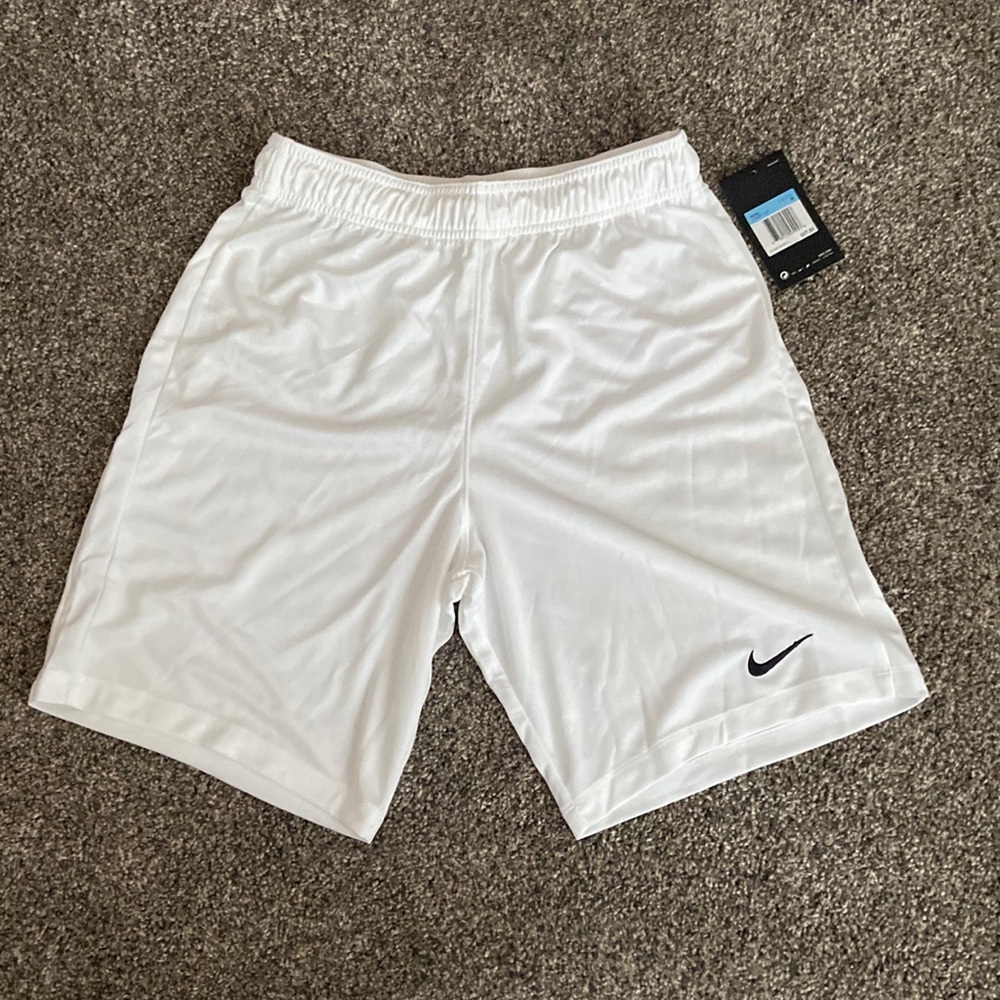 Nike Mens size medium Dri-Fit shorts. White with black swoosh.